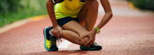 A person sitting due to sports injury